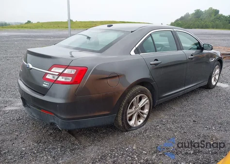2015 Ford Taurus Sel z USA, uszkodzony, nr VIN 1FAHP2H82FG177210